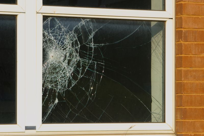 Broken Window with Shattered Glass